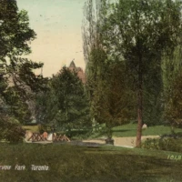 A vintage postcard depicts a tree-lined park with a path and reads “Reservoir Park, Toronto.”